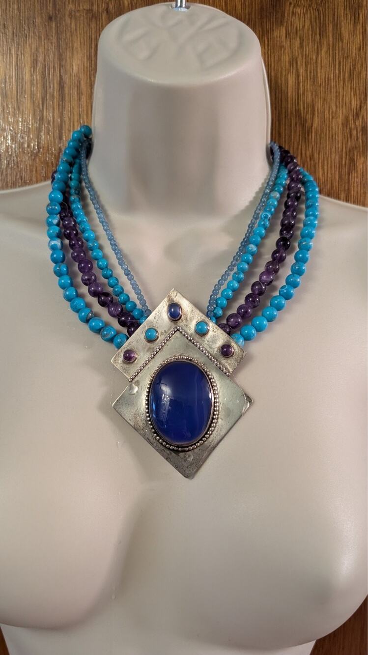 TULLA BOOTH Multi strand necklace with sterling pendant Signed